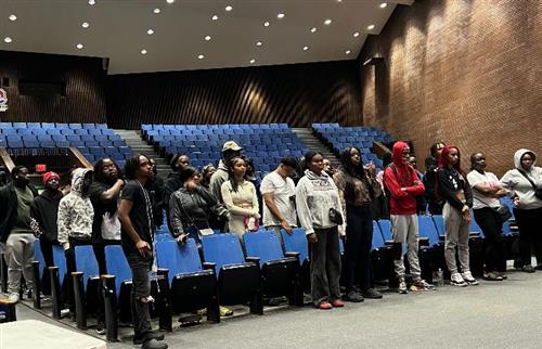 Seniors standing in the auditorium